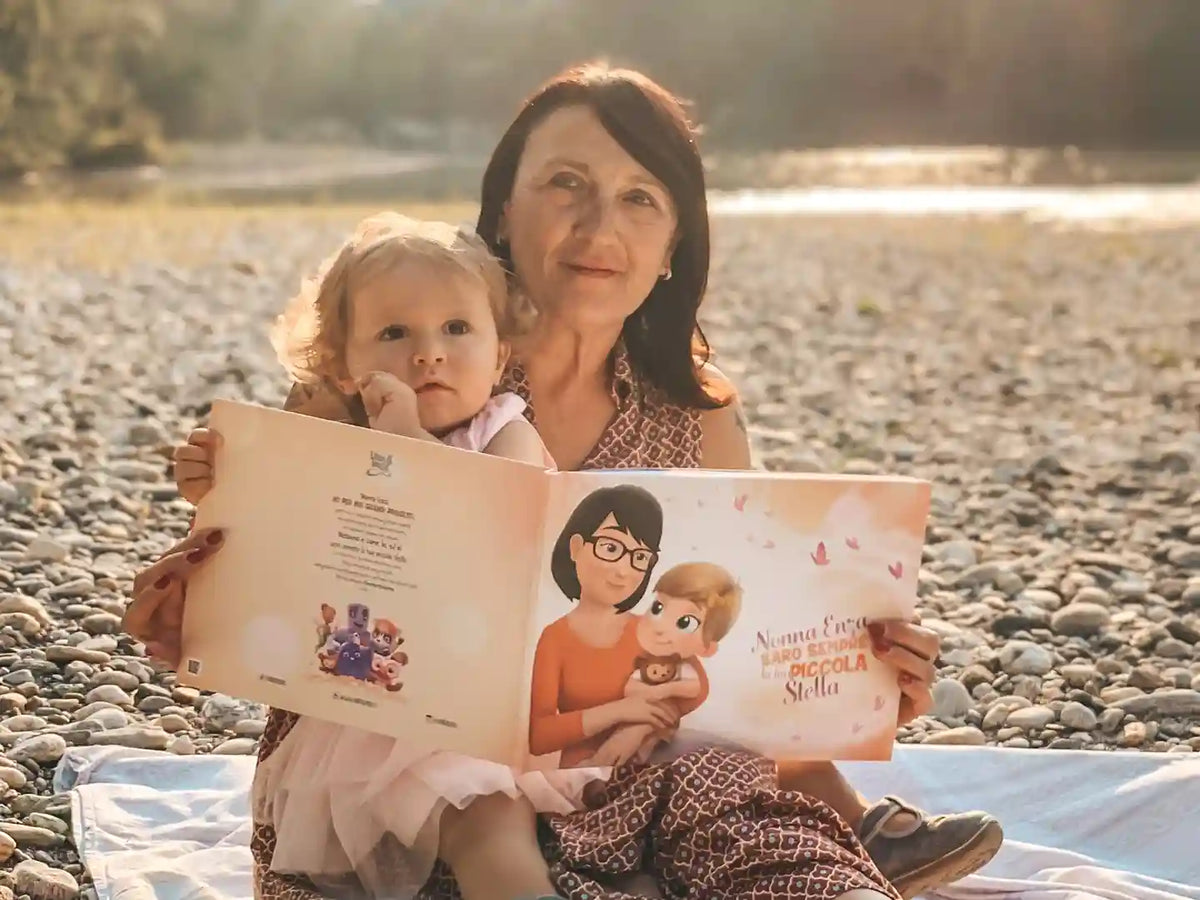 Una nonna leggendo il suo regalo della festa della nonna: un libro personalizzato Urra Eroi.