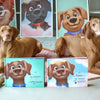 Due cani Vizsla accanto a libri personalizzati di Urrà Eroi con "Kira, la migliore amica a quattro zampe" e "Baldo un' amico per sempre" sulle copertine