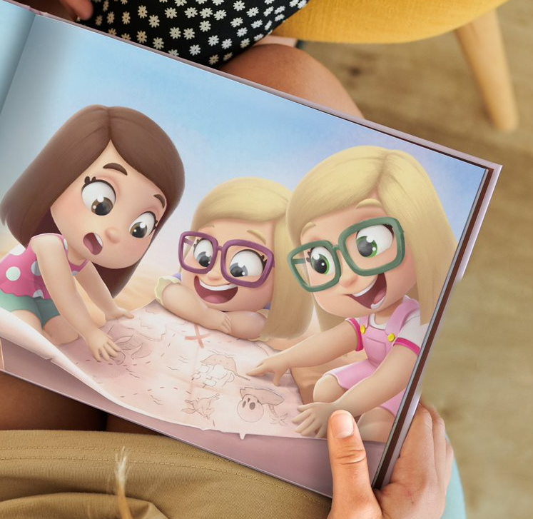Tre sorelle si divertono con il loro libro personalizzato per fratelli.